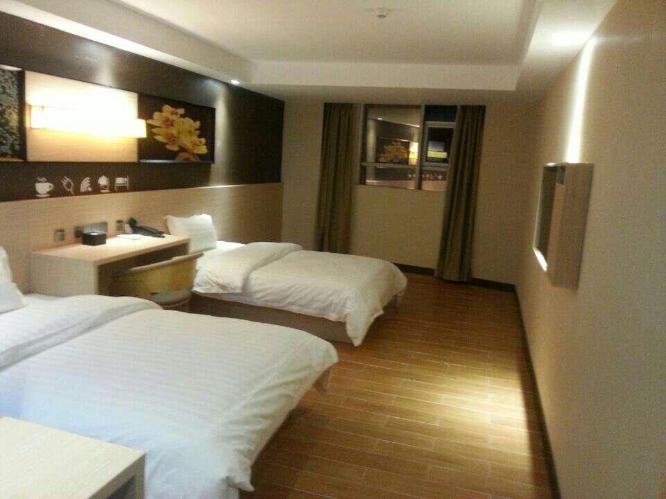 เตียงในห้องที่ 7Days Inn Shunde Lunjiao