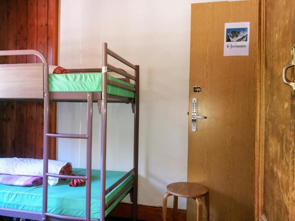 Palanda nebo palandy na pokoji v ubytování Le Chamoniard Volant