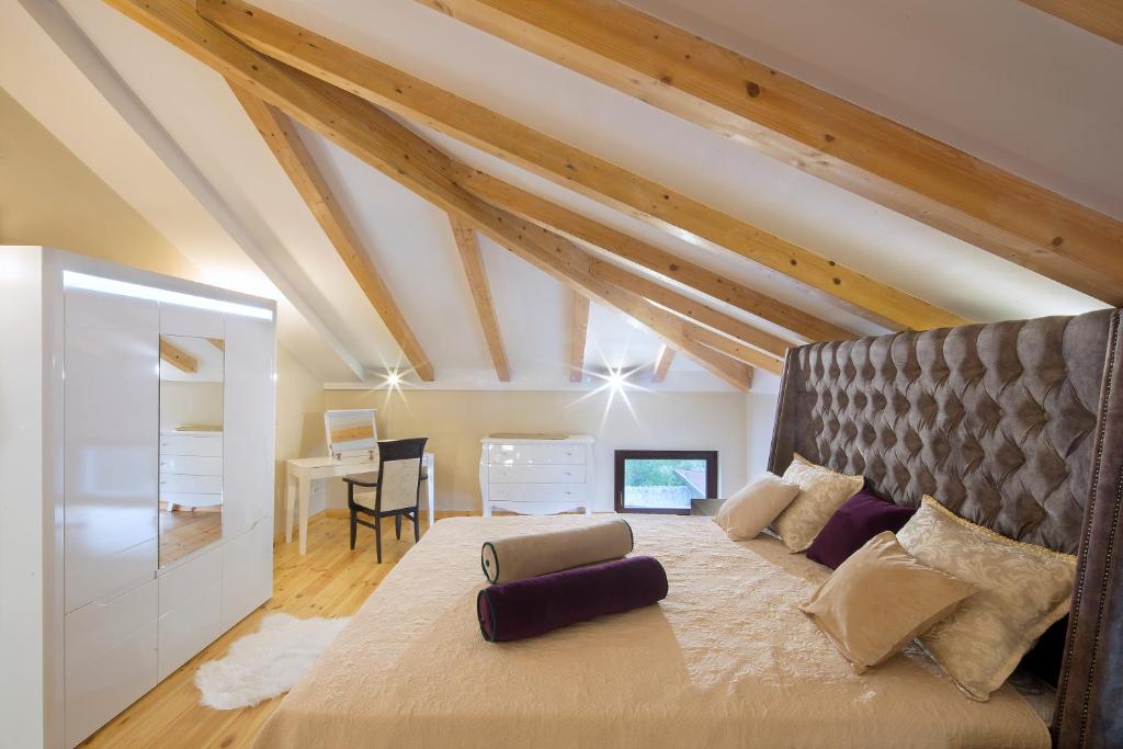 Postel nebo postele na pokoji v ubytování Palazzo Banicevic Luxury Rooms