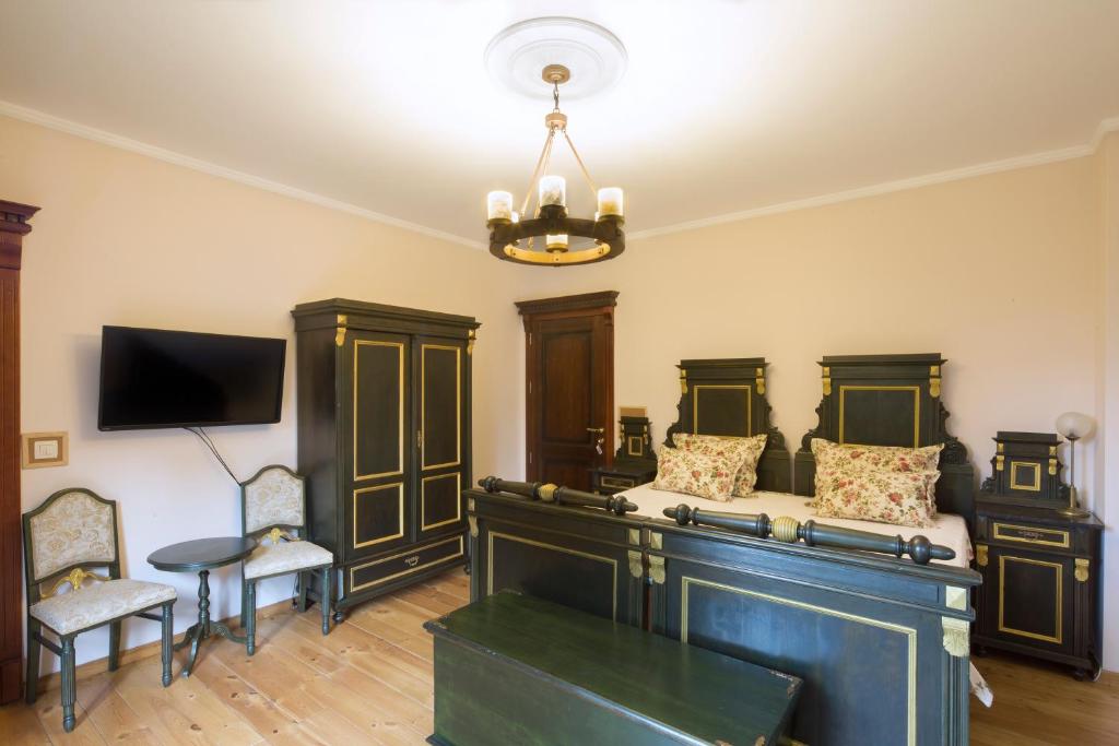 TV a/nebo společenská místnost v ubytování Palazzo Banicevic Luxury Rooms