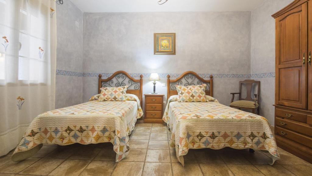 Postel nebo postele na pokoji v ubytování Los Laureles 2