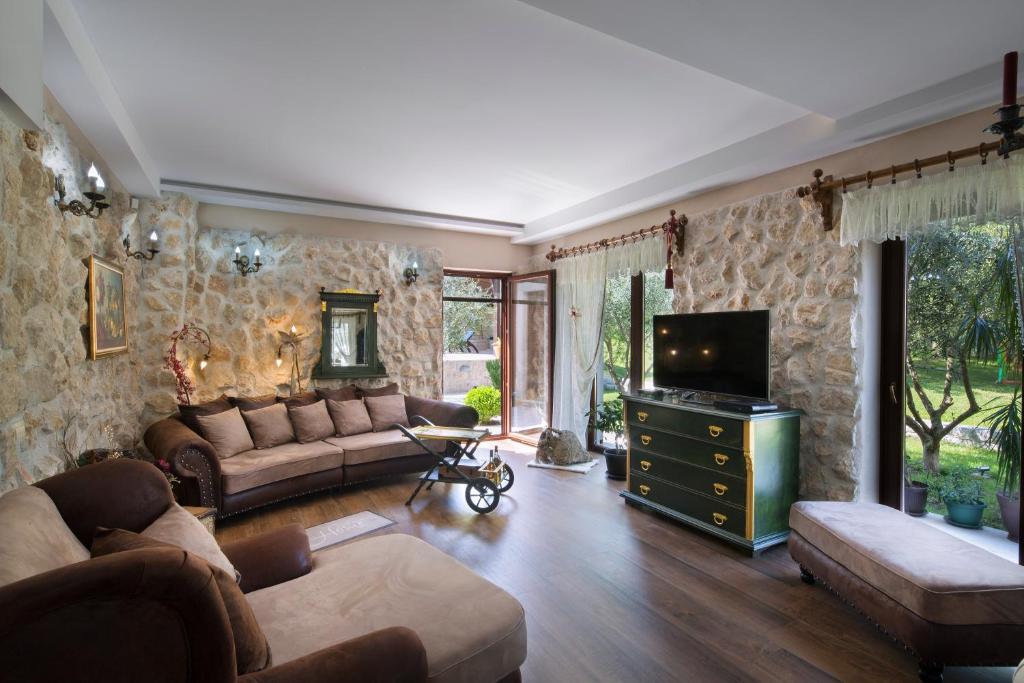 TV a/nebo společenská místnost v ubytování Palazzo Banicevic Luxury Rooms