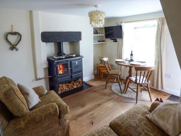 Posezení v ubytování Fells Cottage