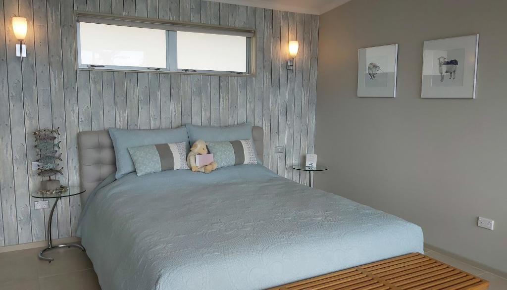 Letto o letti in una camera di The Bay Lodge