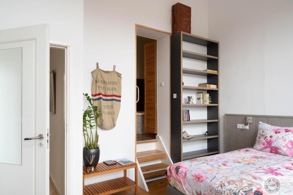 Postel nebo postele na pokoji v ubytování B&B Het Oude Postkantoor