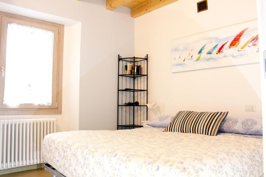 Postel nebo postele na pokoji v ubytování LA MAGNOLIA Guests House