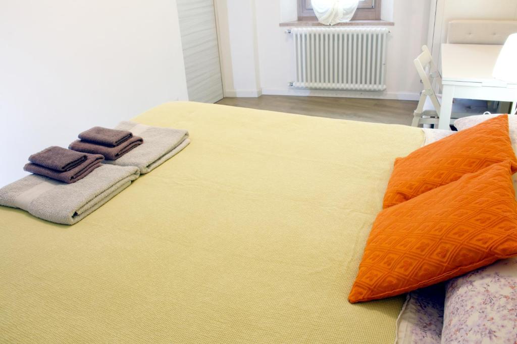 Postel nebo postele na pokoji v ubytování LA MAGNOLIA Guests House