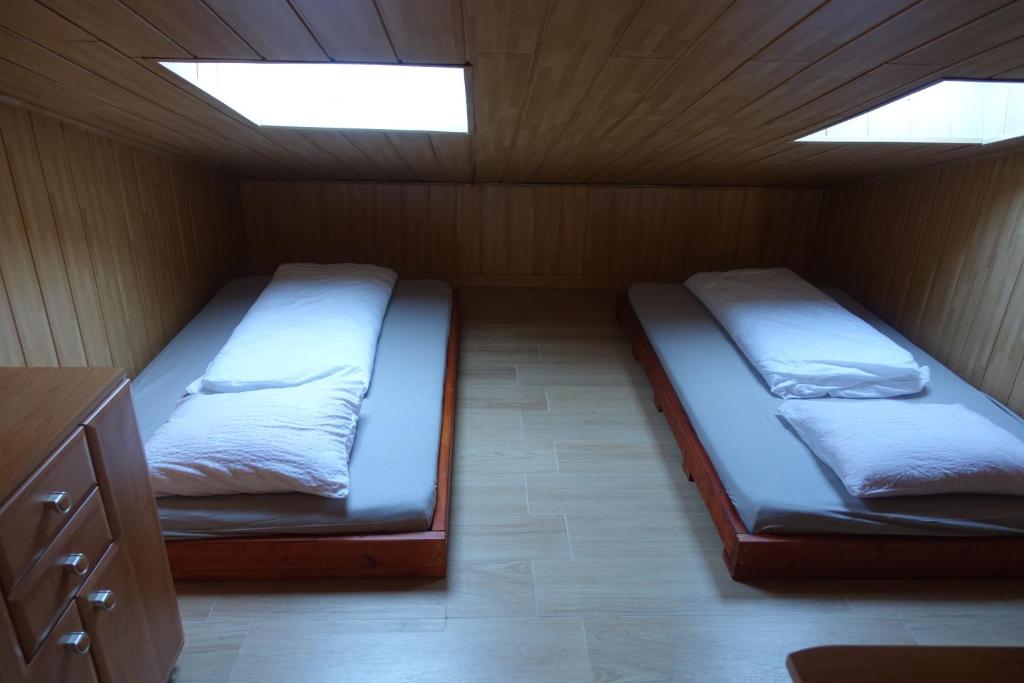 Postel nebo postele na pokoji v ubytování Apartments Kaninska Vas