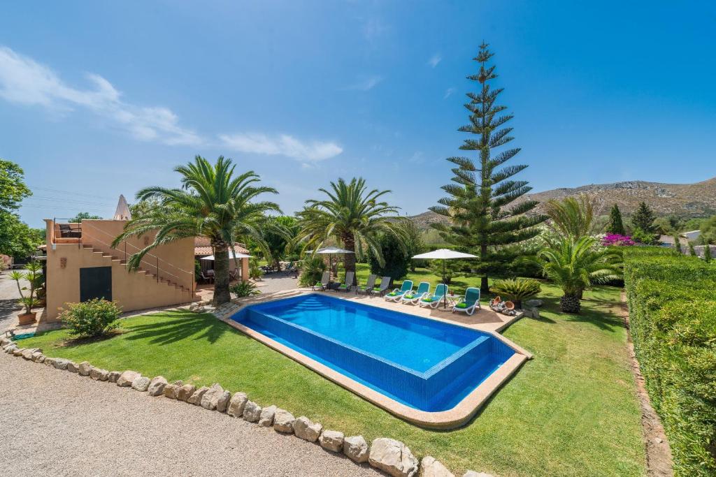an image of a swimming pool in a yard at Casa Angela in Capdepera