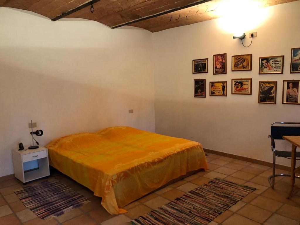 A bed or beds in a room at CASE&COLLINE La Prospettiva