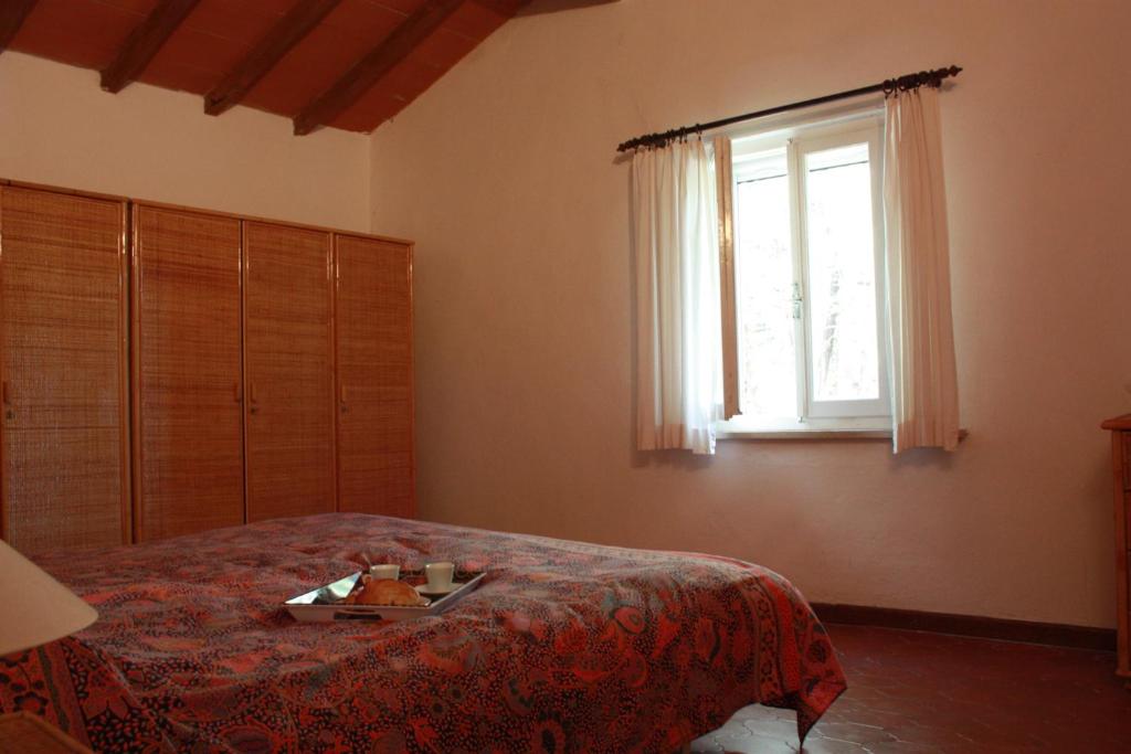 A bed or beds in a room at CASE&COLLINE La Prospettiva