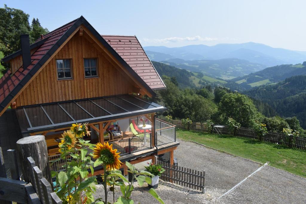 a house with a view of the mountains at Ferienhaus Schleinzer in Prebl