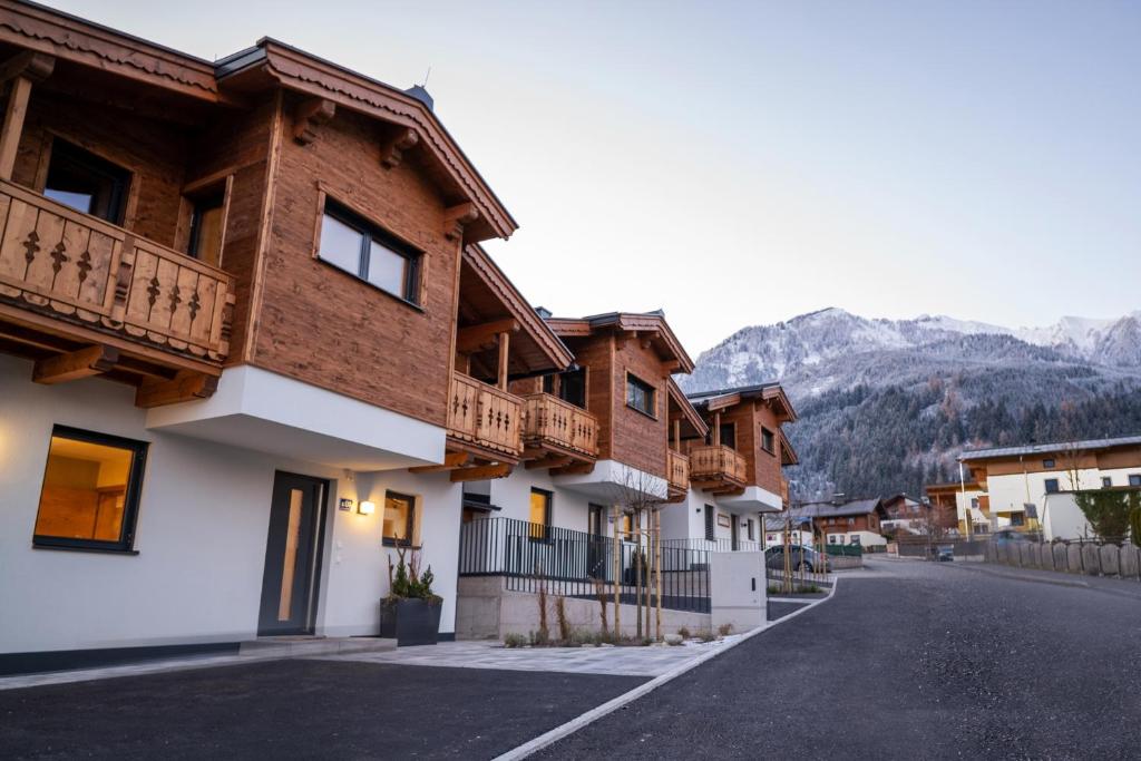 a view of a street in a mountain village at First IN Mountain Chalets by we rent in Kaprun