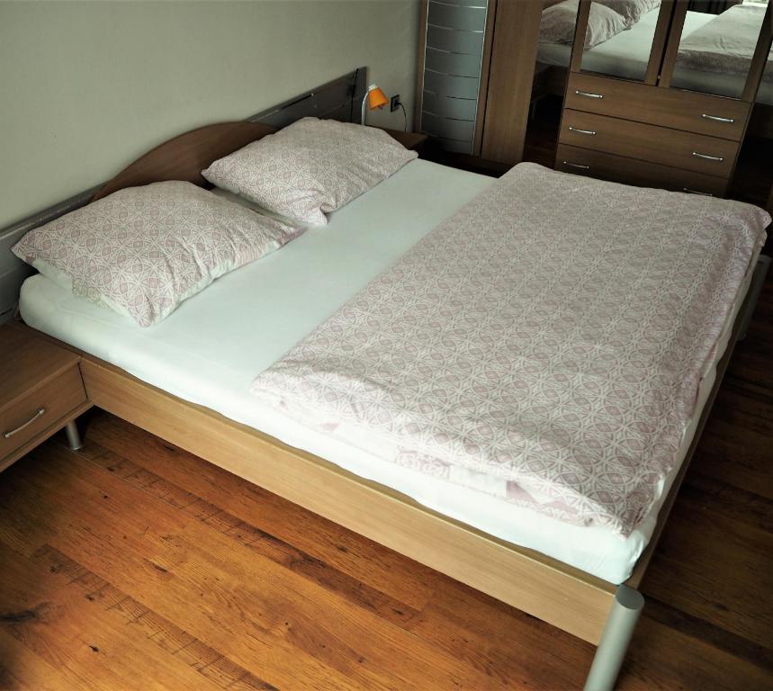 Postel nebo postele na pokoji v ubytování Apartmán Adam