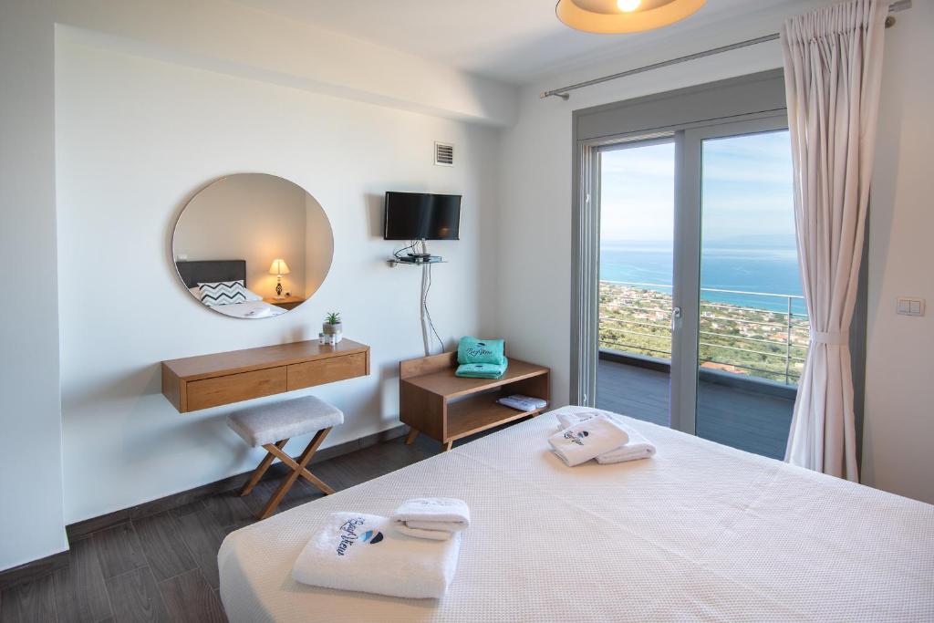 Posteľ alebo postele v izbe v ubytovaní Bay View GuestHouses