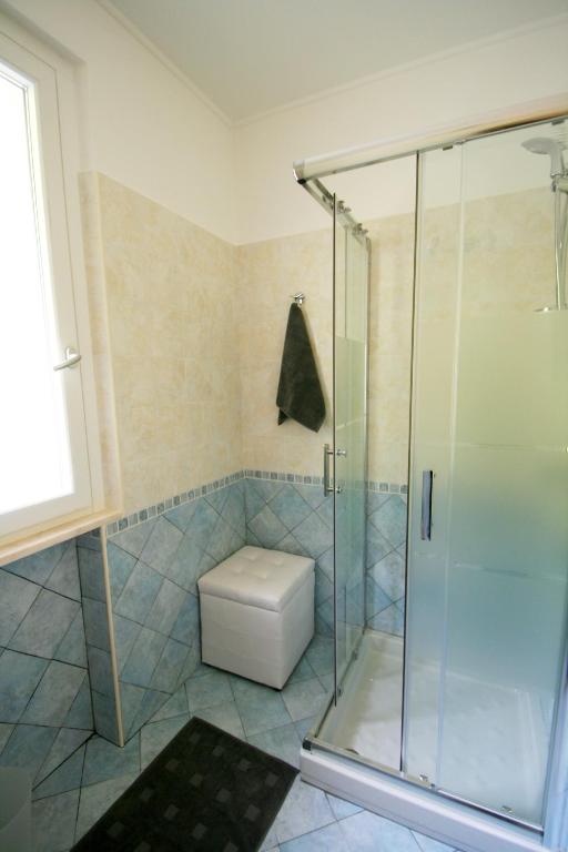 Een badkamer bij Villa Oliveto apartments