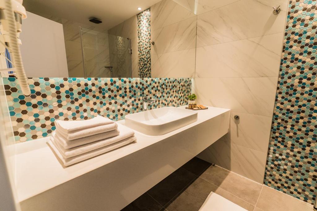 Koupelna v ubytování Hotel Aventus