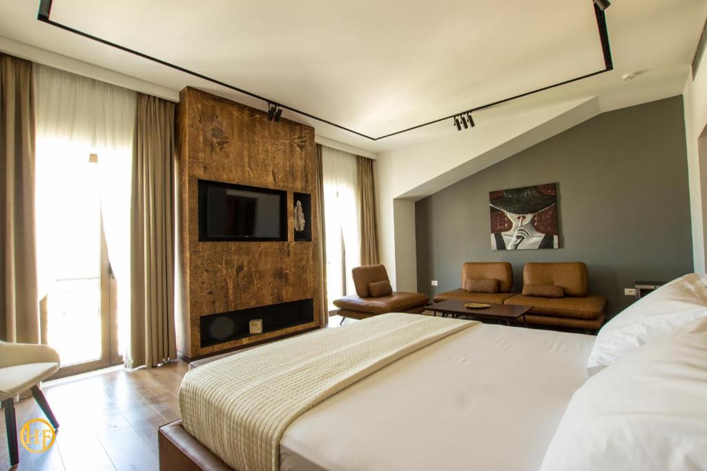 Postel nebo postele na pokoji v ubytování Hotel Fantasy