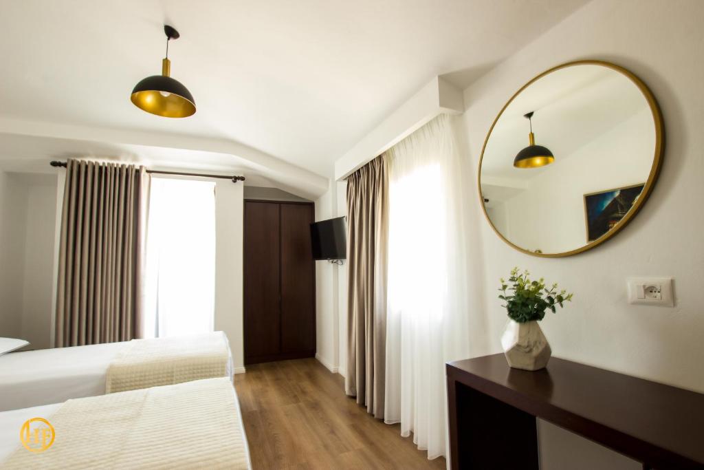 Postel nebo postele na pokoji v ubytování Hotel Fantasy