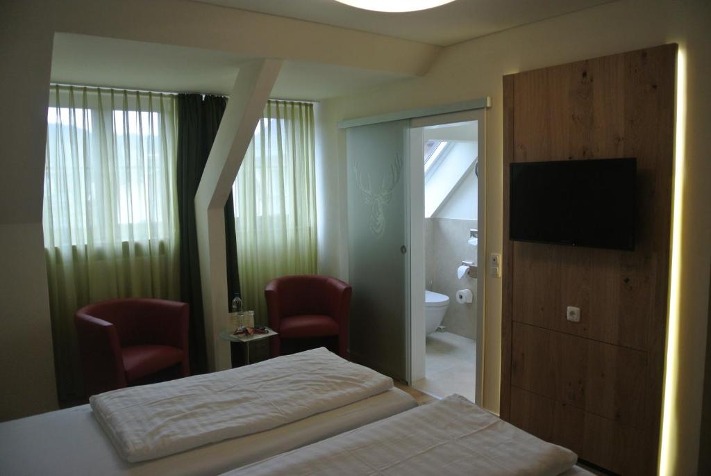 Postel nebo postele na pokoji v ubytování Hotel Jägerhof
