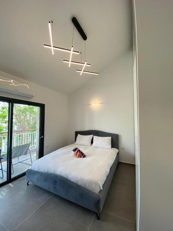 Ein Bett oder Betten in einem Zimmer der Unterkunft Top Royal Eilat רויאל פארק
