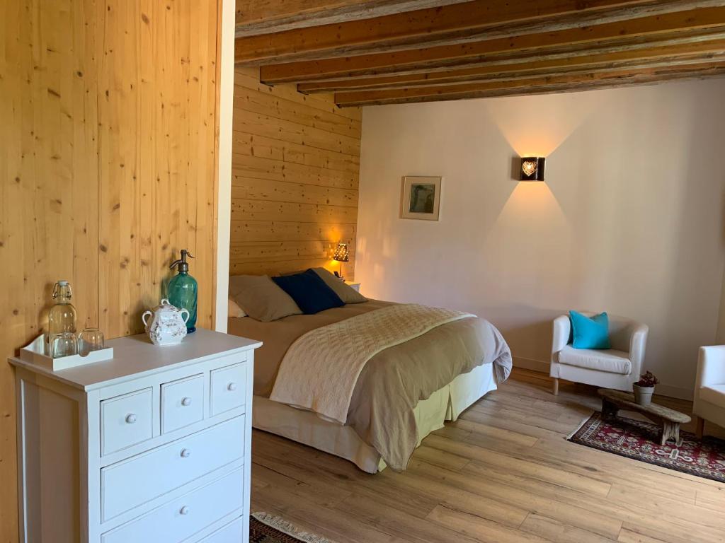 Postel nebo postele na pokoji v ubytování La Colonie - Maison d'Hôtes