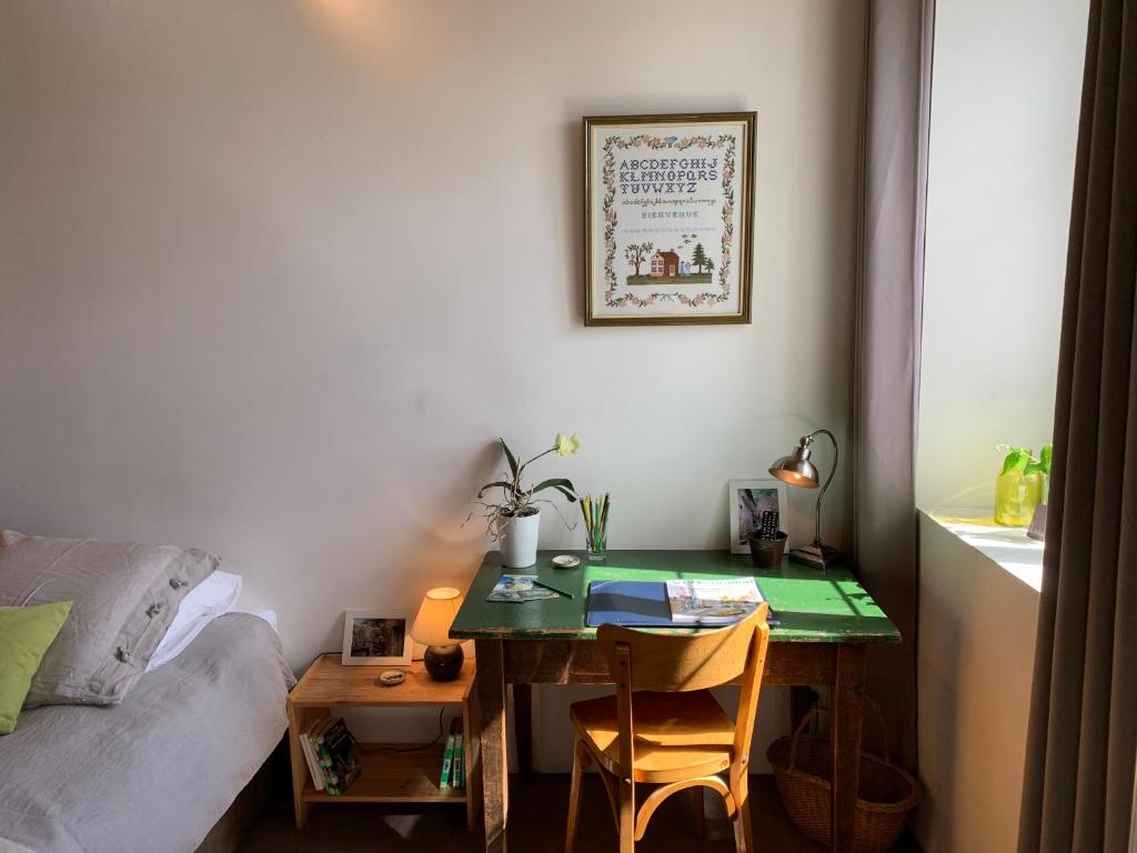 Postel nebo postele na pokoji v ubytování La Colonie - Maison d'Hôtes