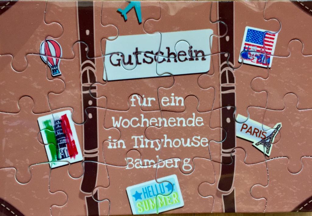a jigsaw puzzle with the words australium and a building at Tinyhouse Bamberg in Pettstadt