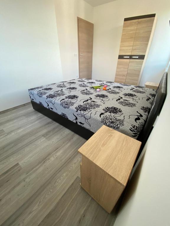 Posteľ alebo postele v izbe v ubytovaní Mifi Apartman Balatonlelle