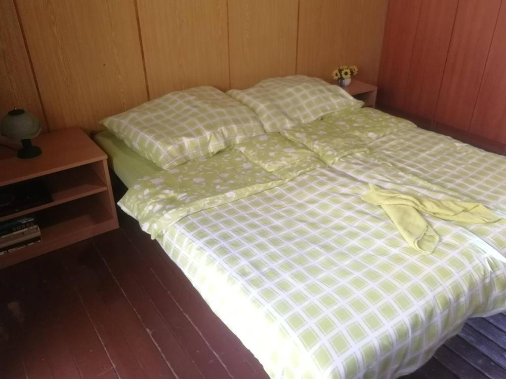 Posteľ alebo postele v izbe v ubytovaní CHATA POD VLEKOM