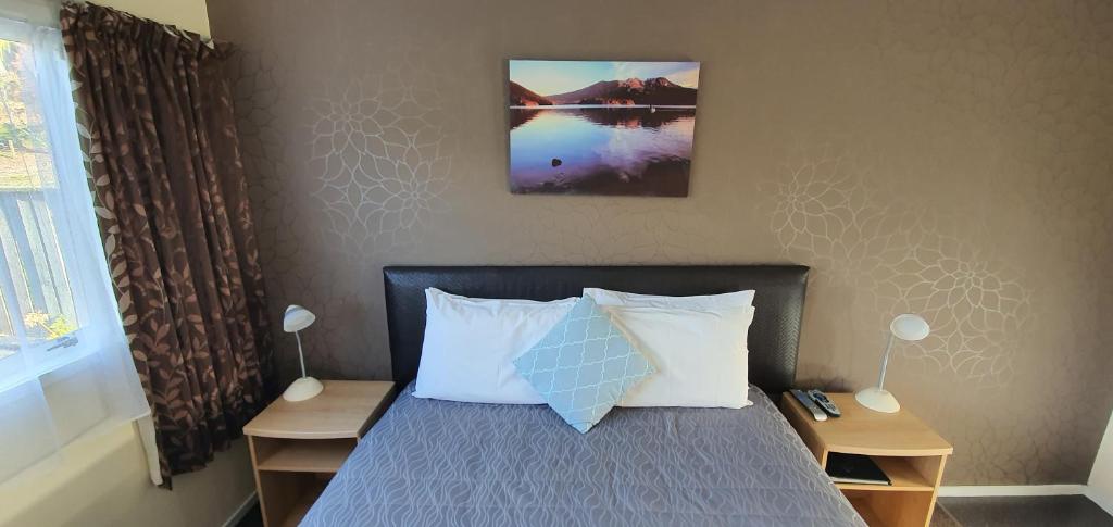 Postel nebo postele na pokoji v ubytování Accent On Taupo Motor Lodge