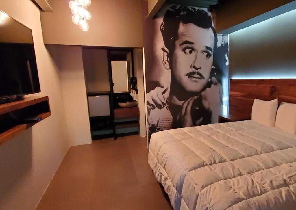 Postel nebo postele na pokoji v ubytování HOTEL RIO RITA