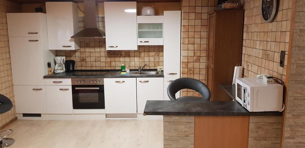 Kuchyň nebo kuchyňský kout v ubytování Haus Daniel Mariazell