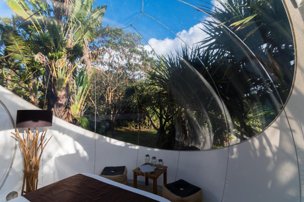 Balkón nebo terasa v ubytování Bubble Lodge Bois Chéri Plantation