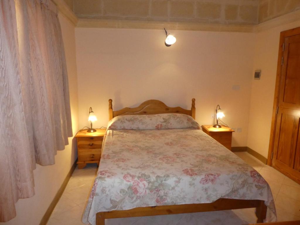 Postel nebo postele na pokoji v ubytování San Antonio Guesthouse