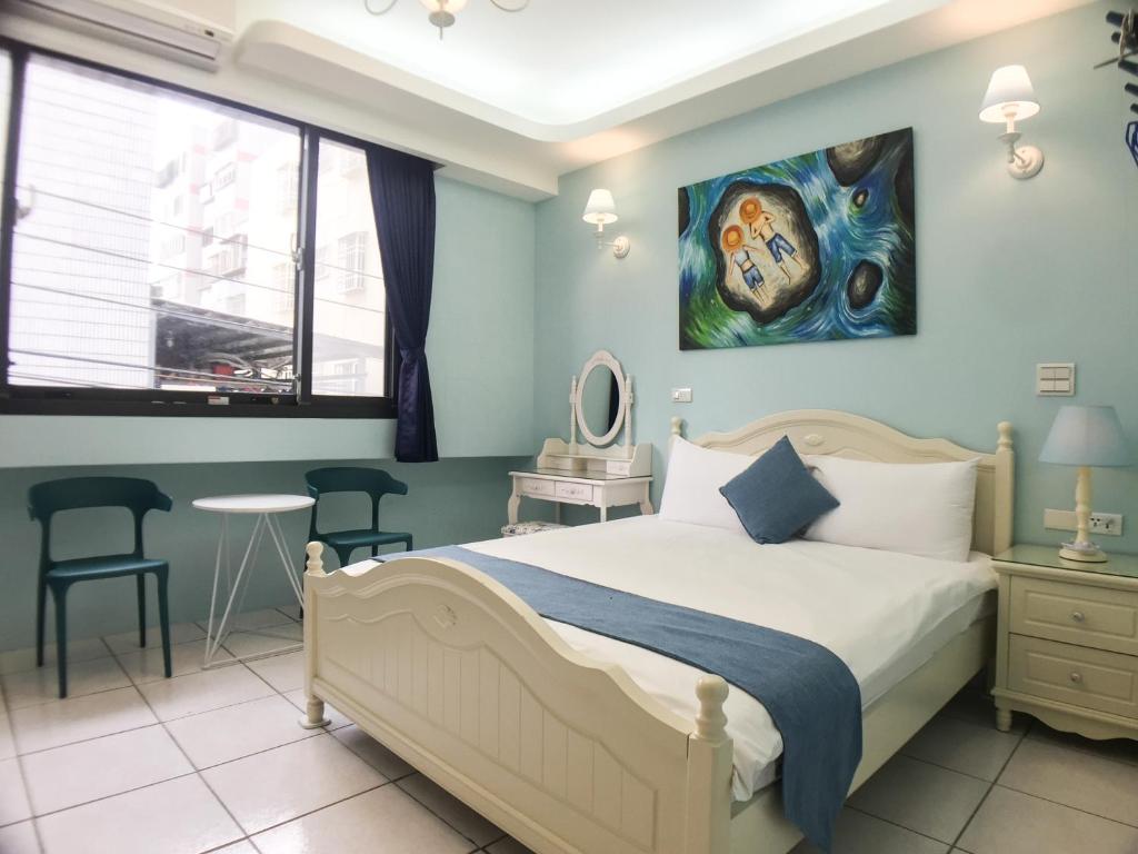 Postel nebo postele na pokoji v ubytování Hualien Dawan B&B