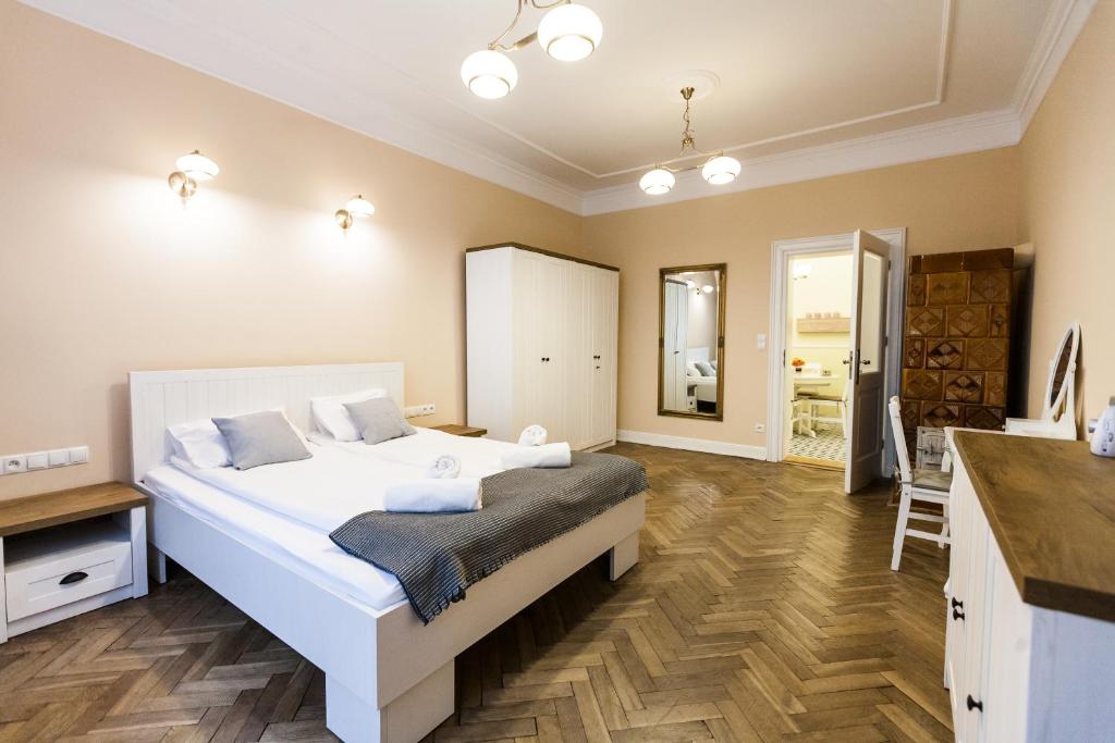 Posteľ alebo postele v izbe v ubytovaní Vintage Poselska Apartment