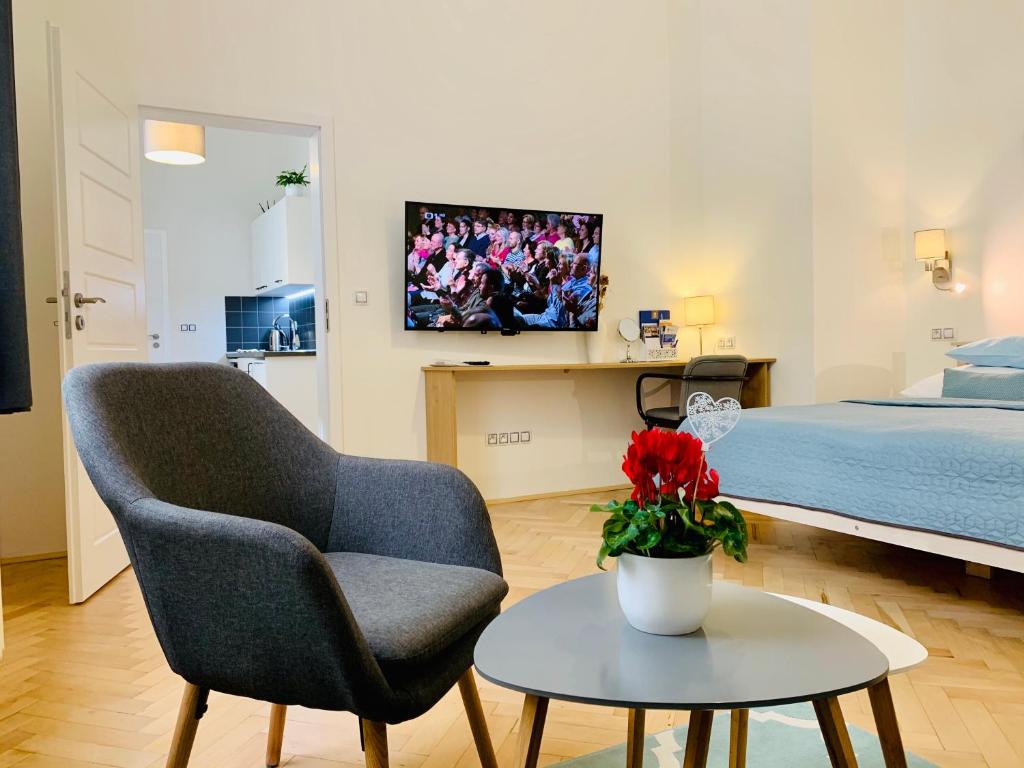 Telewizja i/lub zestaw kina domowego w obiekcie Marienbad Apartment