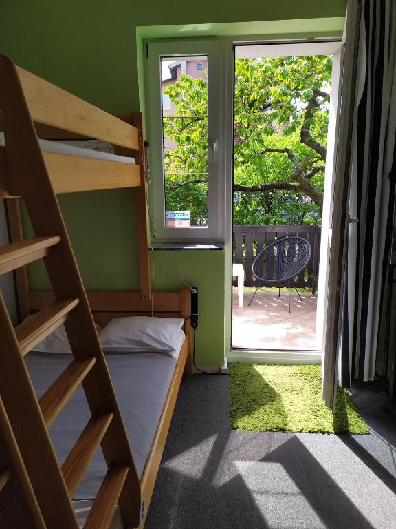Postel nebo postele na pokoji v ubytování Olive Hostel