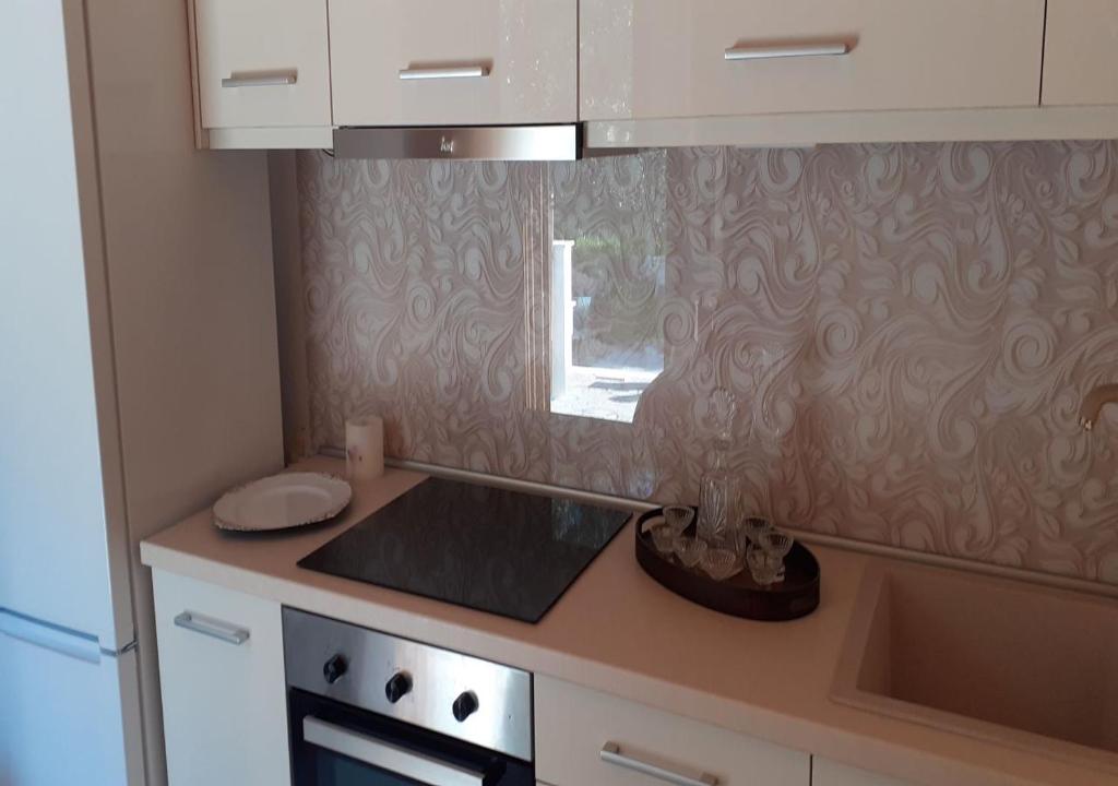 Kuchyň nebo kuchyňský kout v ubytování Anna - Maria Luxury Suite