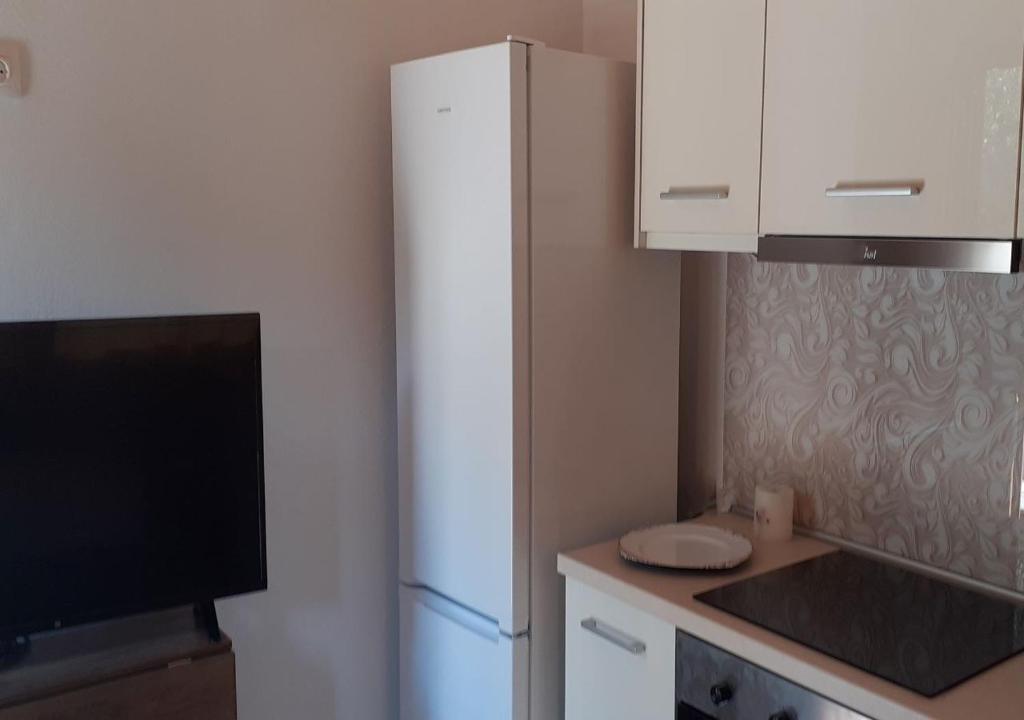 Kuchyň nebo kuchyňský kout v ubytování Anna - Maria Luxury Suite