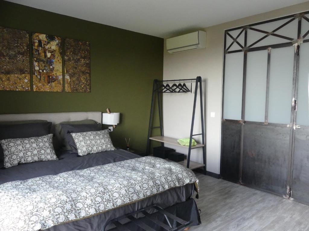 Ένα ή περισσότερα κρεβάτια σε δωμάτιο στο Casa Peppina - Chez Tonio et Sylvie