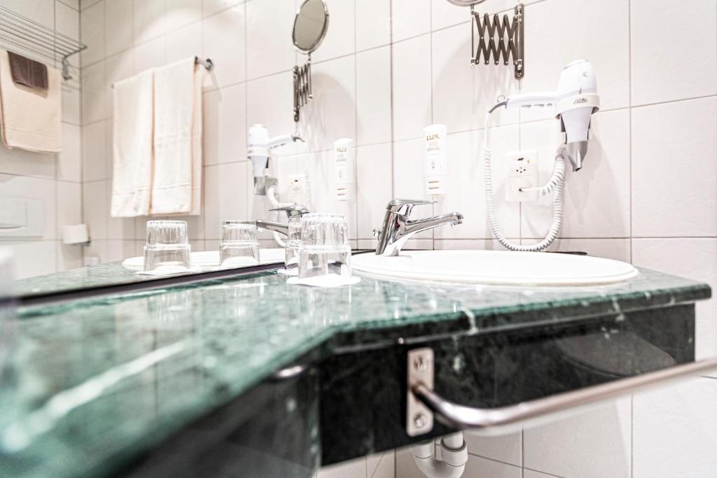 Koupelna v ubytování Hotel Münchwilen