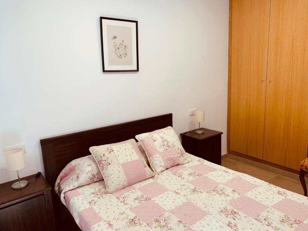 Postel nebo postele na pokoji v ubytování Casa del Herrero