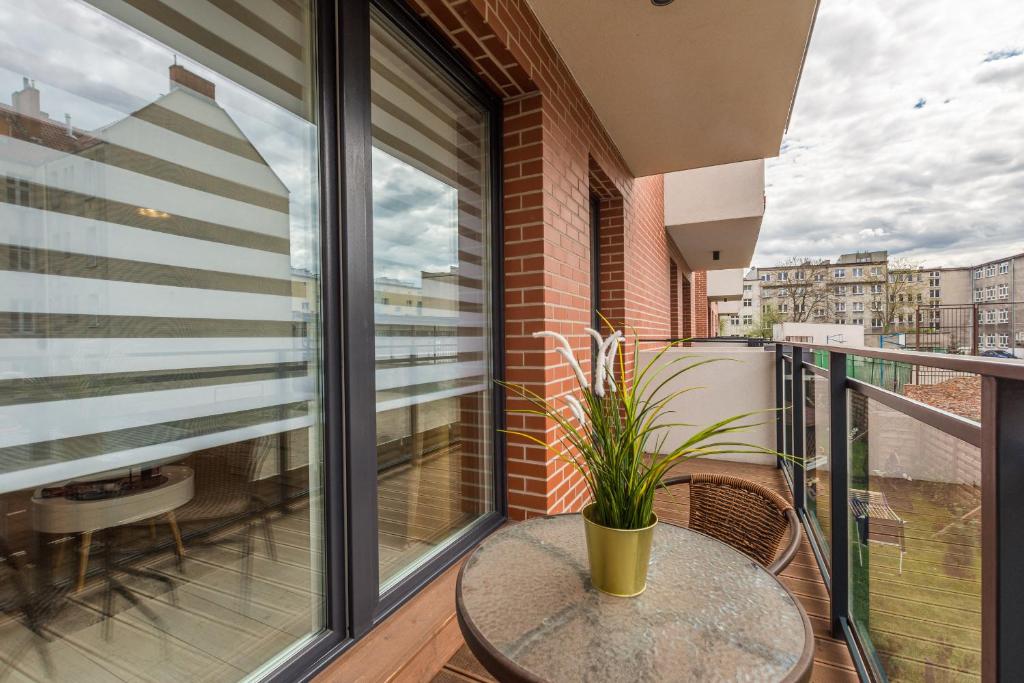 Balkón alebo terasa v ubytovaní Grobla by Loft Apartments