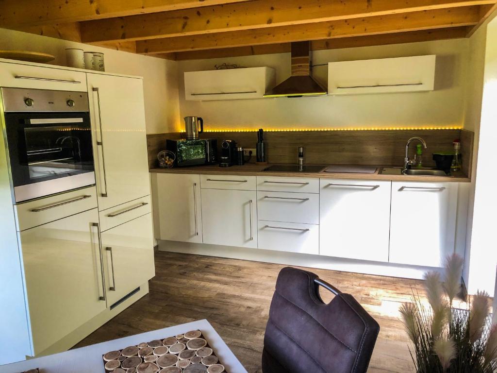 Kuchyň nebo kuchyňský kout v ubytování Surrbach Chalet