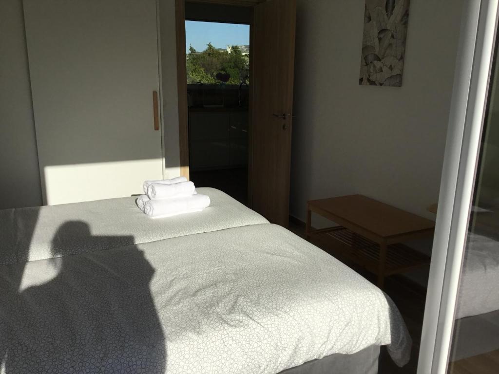 Postel nebo postele na pokoji v ubytování Oikia Ampavris