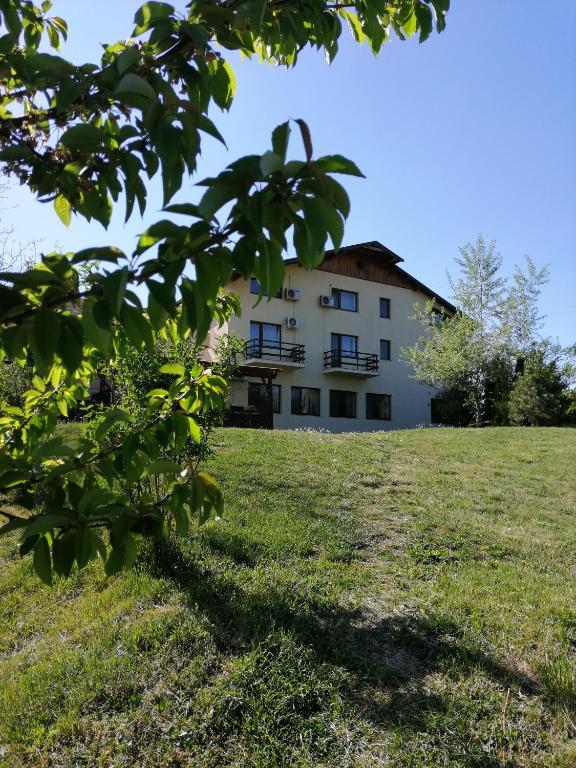 an external view of the house from the field at Kolpinghaus in Caransebeş
