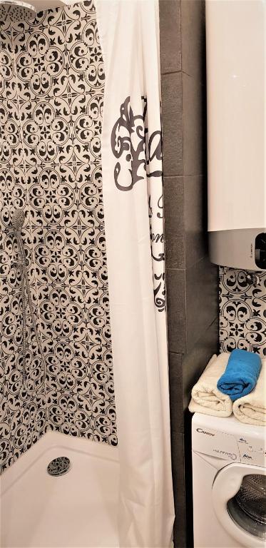 Kúpeľňa v ubytovaní APARTAMENT CENTRUM PARK ul WASZYNGTONA