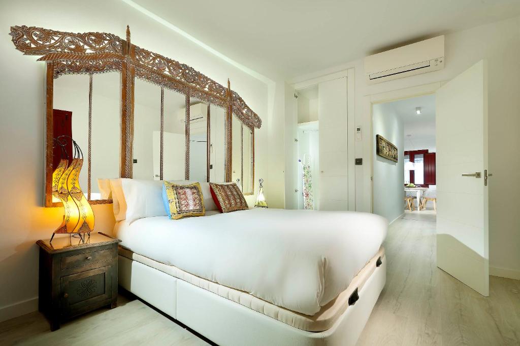 A bed or beds in a room at Art Chapiz Apartments